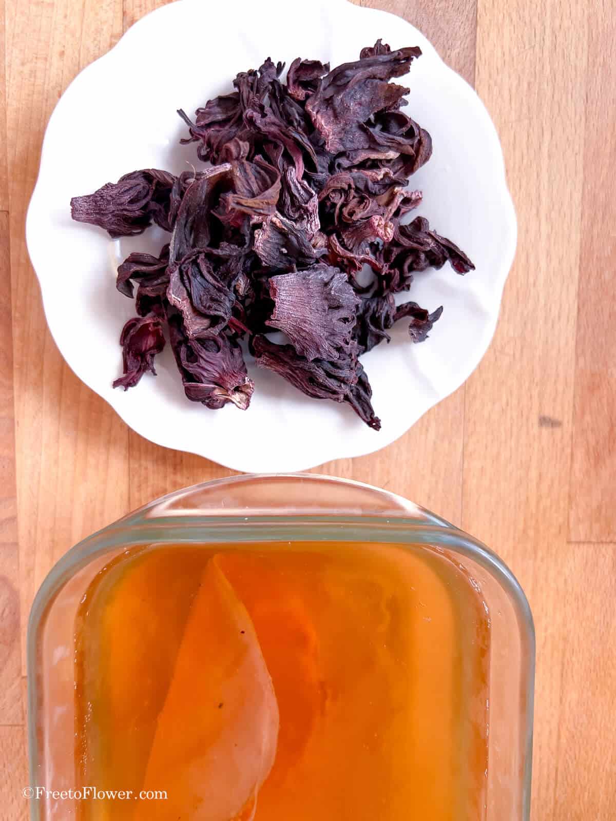 kombucha starter tea, scoby and hibiscus tea flowers