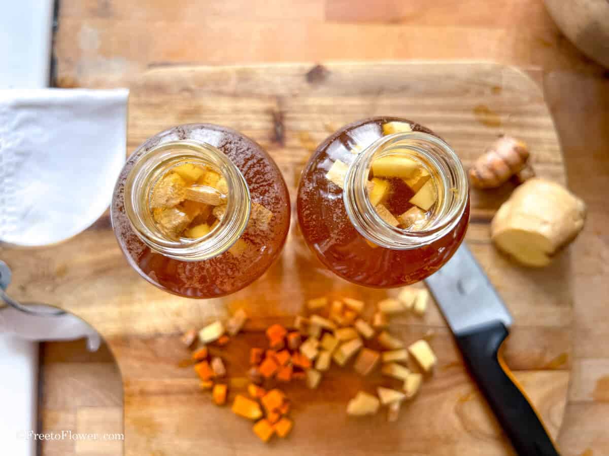 two bottles of ginger & turmeric kombucha