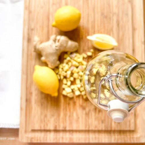 ginger, lemon and a kombucha bottle