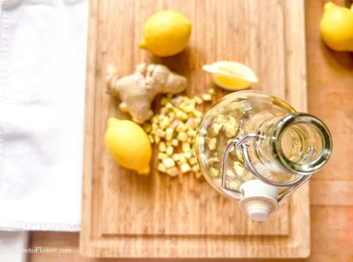 ginger, lemon and a kombucha bottle