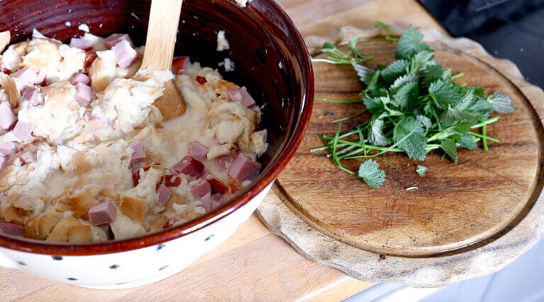 mixing in fresh cut nettles