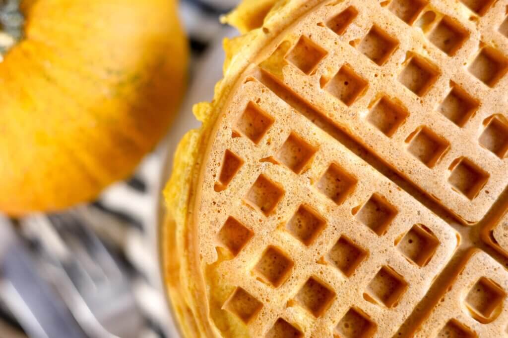 a close up of waffles