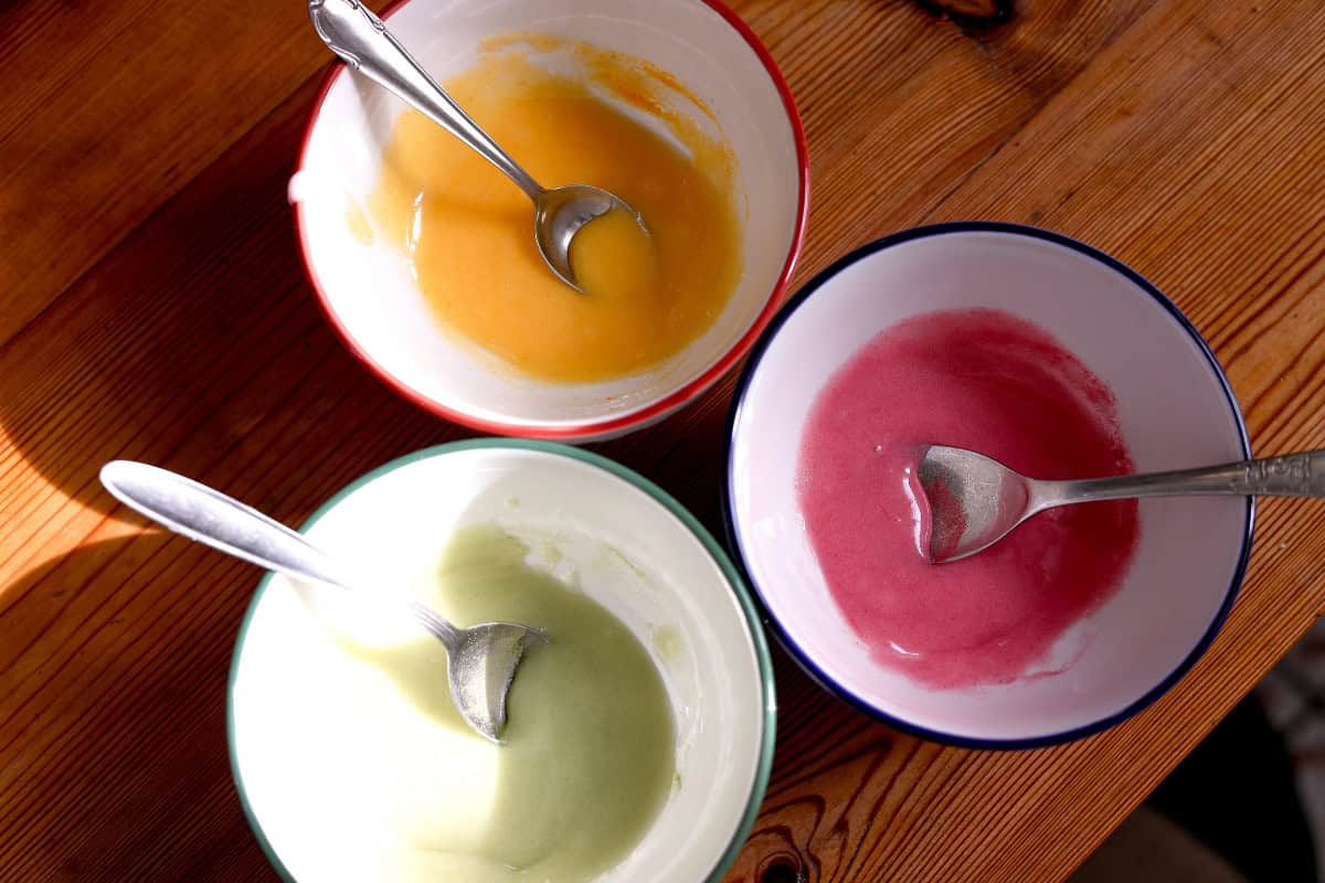 three bowls with different color glaze