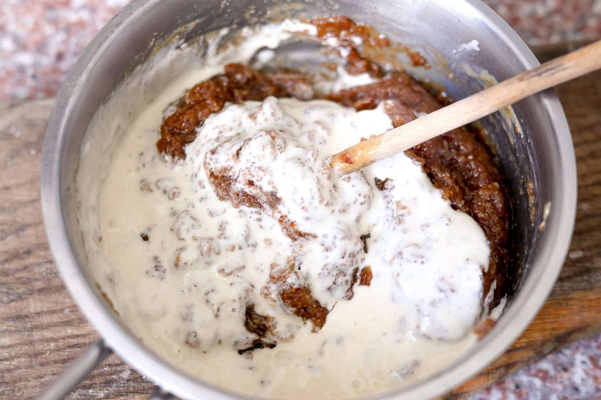 added sourdough discard to the warm wet mixture